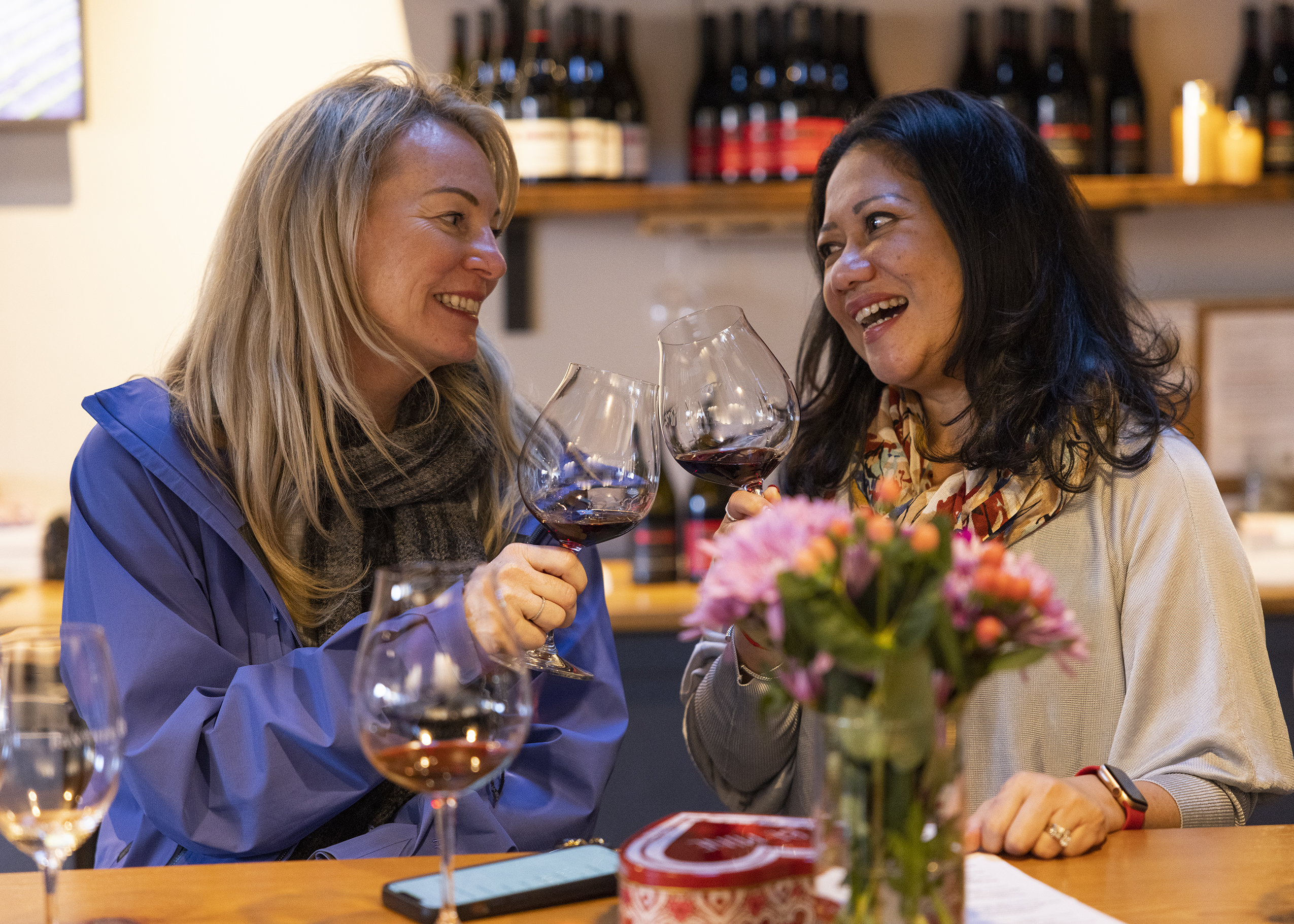 Panther creek live events guests cheersing Leslie Glassman